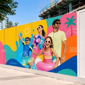 Diverse family enjoying summer fun on a colorful, beach-themed mural